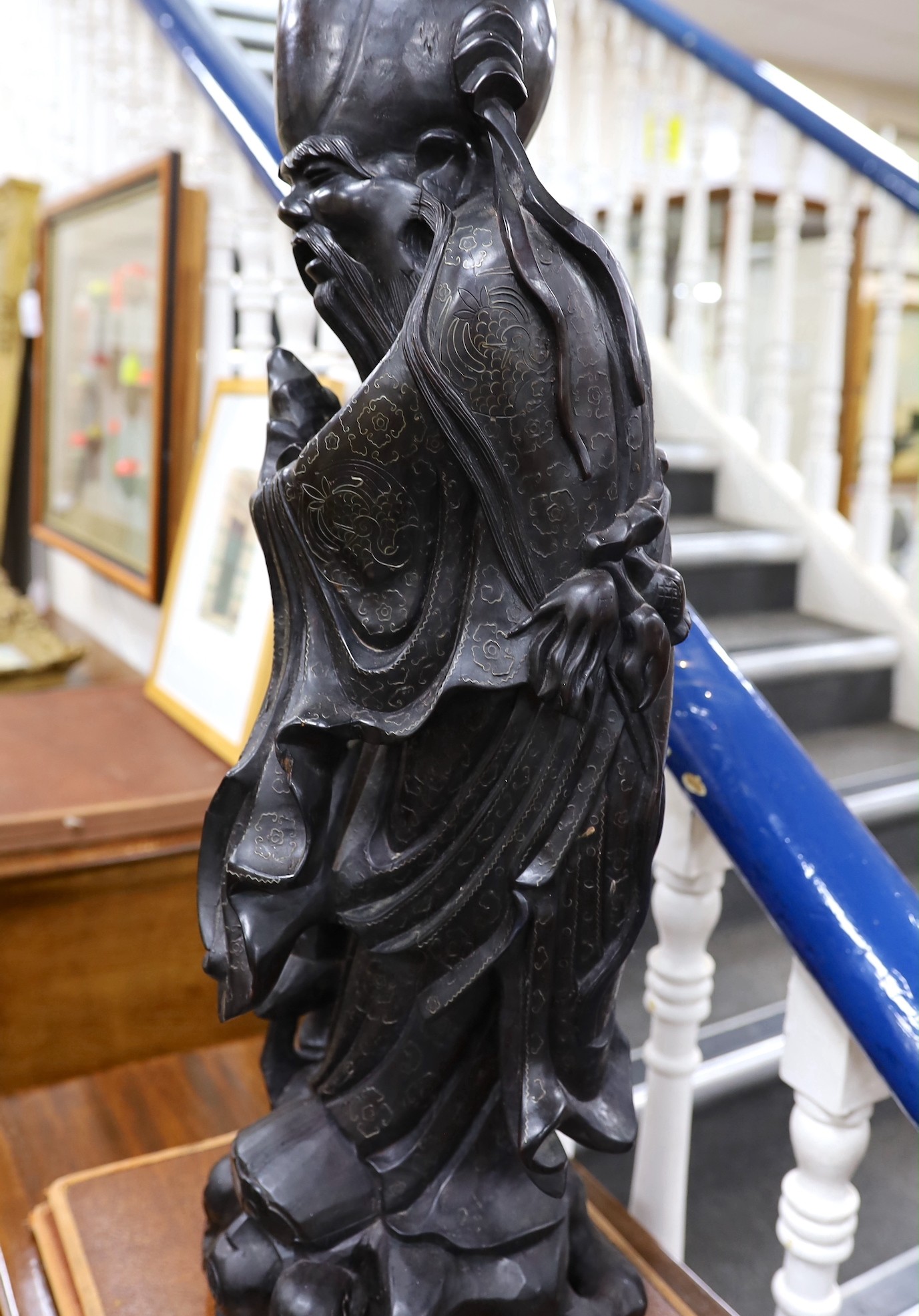 A large Chinese hardwood figure of Shou Lao, first half 20th century, 82cm tall